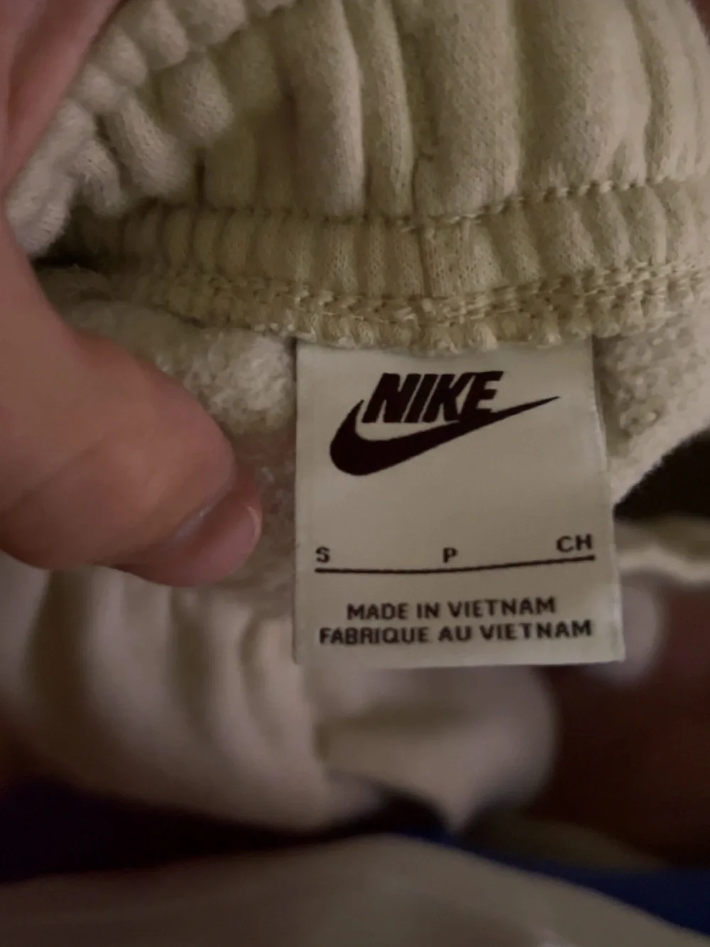 Nike Tan Sweatpants with White Swoosh Logo